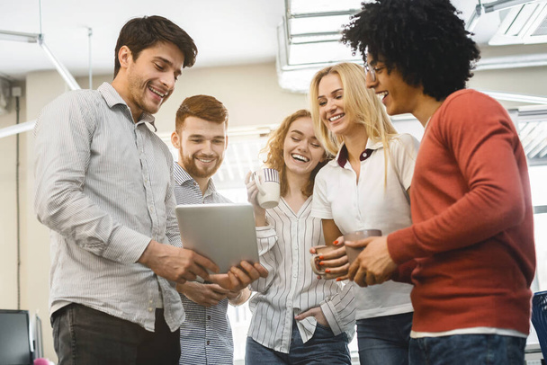 stock photo creative team sharing business ideas during coffee break